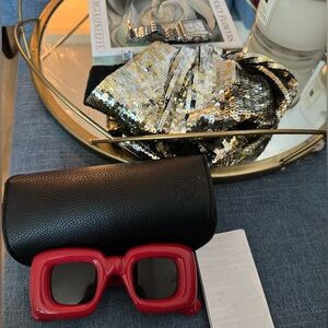 Red Bubble Loewe Sunglasses. These sunglasses are in great condition. Stylish.